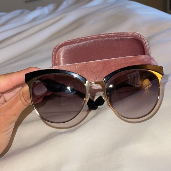MIU MIU Black sunglasses
